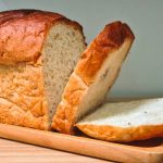 Homemade sourdough bread on a wooden cutting board